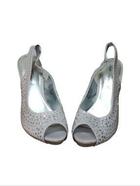 Lulu Townsend Silver Heels size 7!